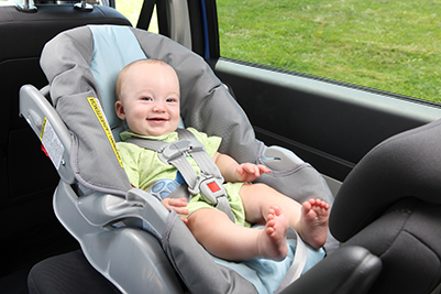 child safely buckled into a car seat