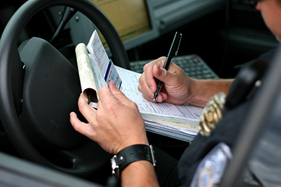 police officer writing a ticket